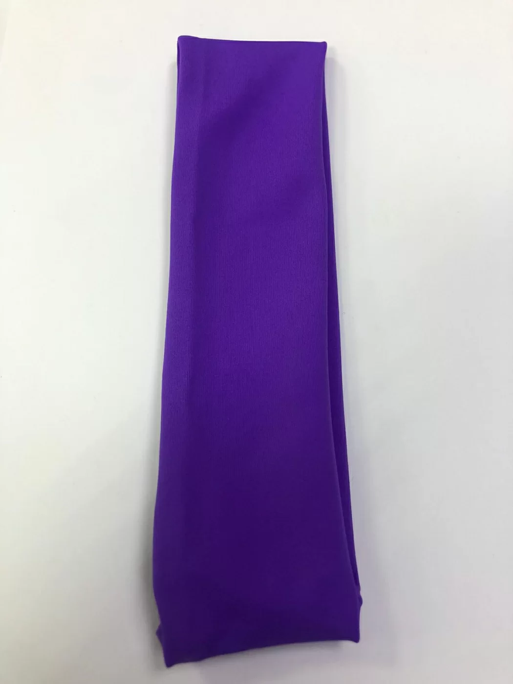 Реальное фото Повязка на голову Combosport бифлекс фиолетовая от магазина СпортСЕ