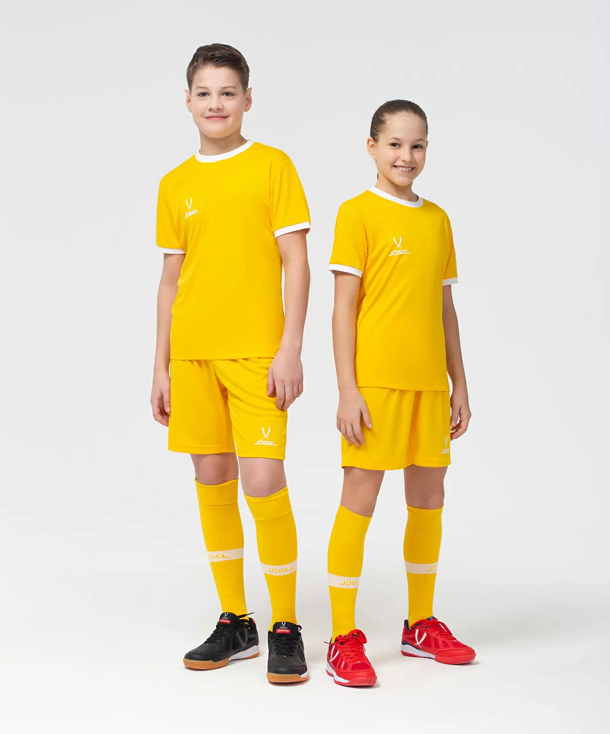 Реальное фото Футболка футбольная CAMP Origin, желтый/белый, детский от магазина СпортСЕ